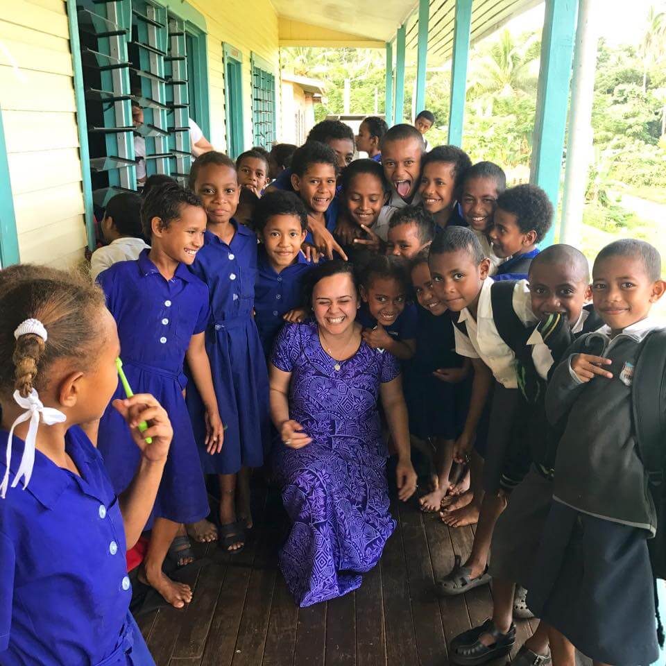 Arieta Rika with school children in Vanua Levu, Fiji.