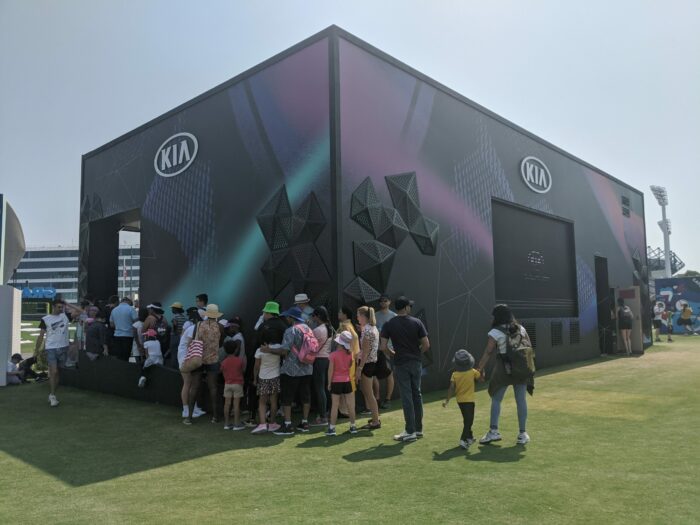 Crowds of tennis fans wait outside the 2020 Kia Australian Open stand in Melbourne.