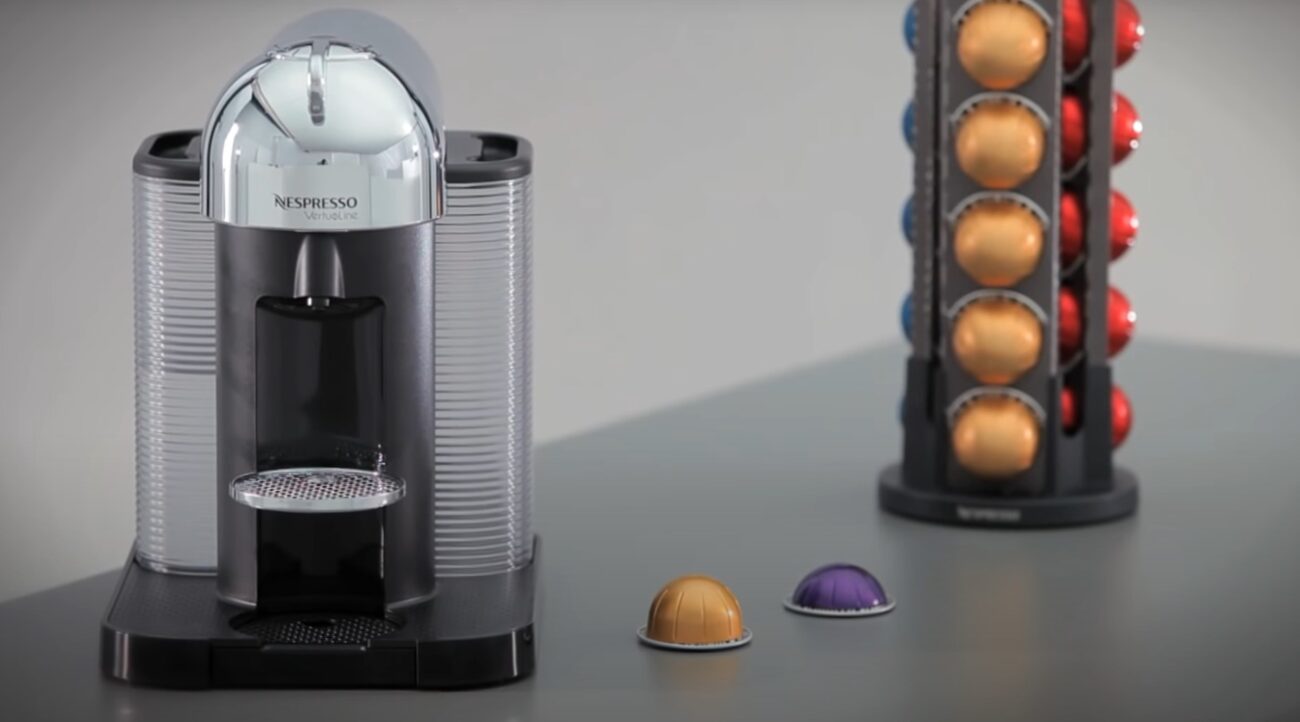 Nespresso Vertuo capsule coffee machine and capsule stand.