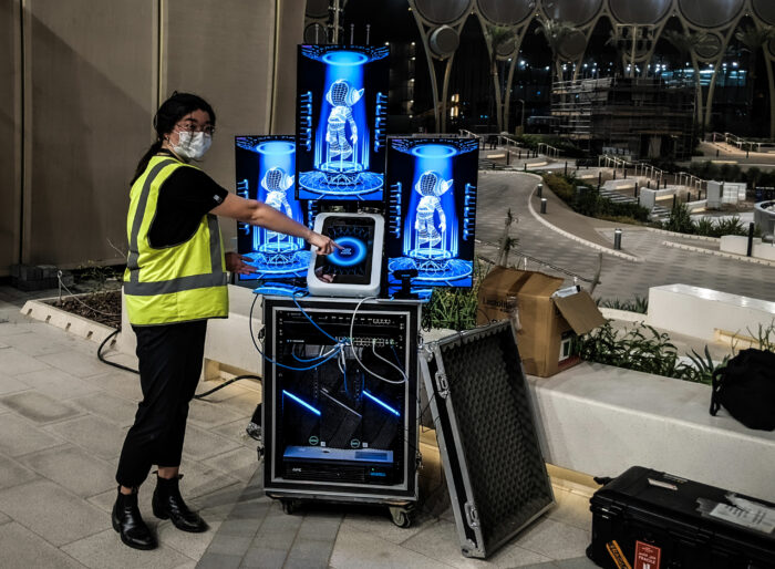 Natalie Robinson from creative studio S1T2 tests interactive projection experience for Dubai World Expo.