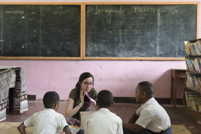 S1T2 team member talks to Fijian students about the Beyond the Stars health education program.