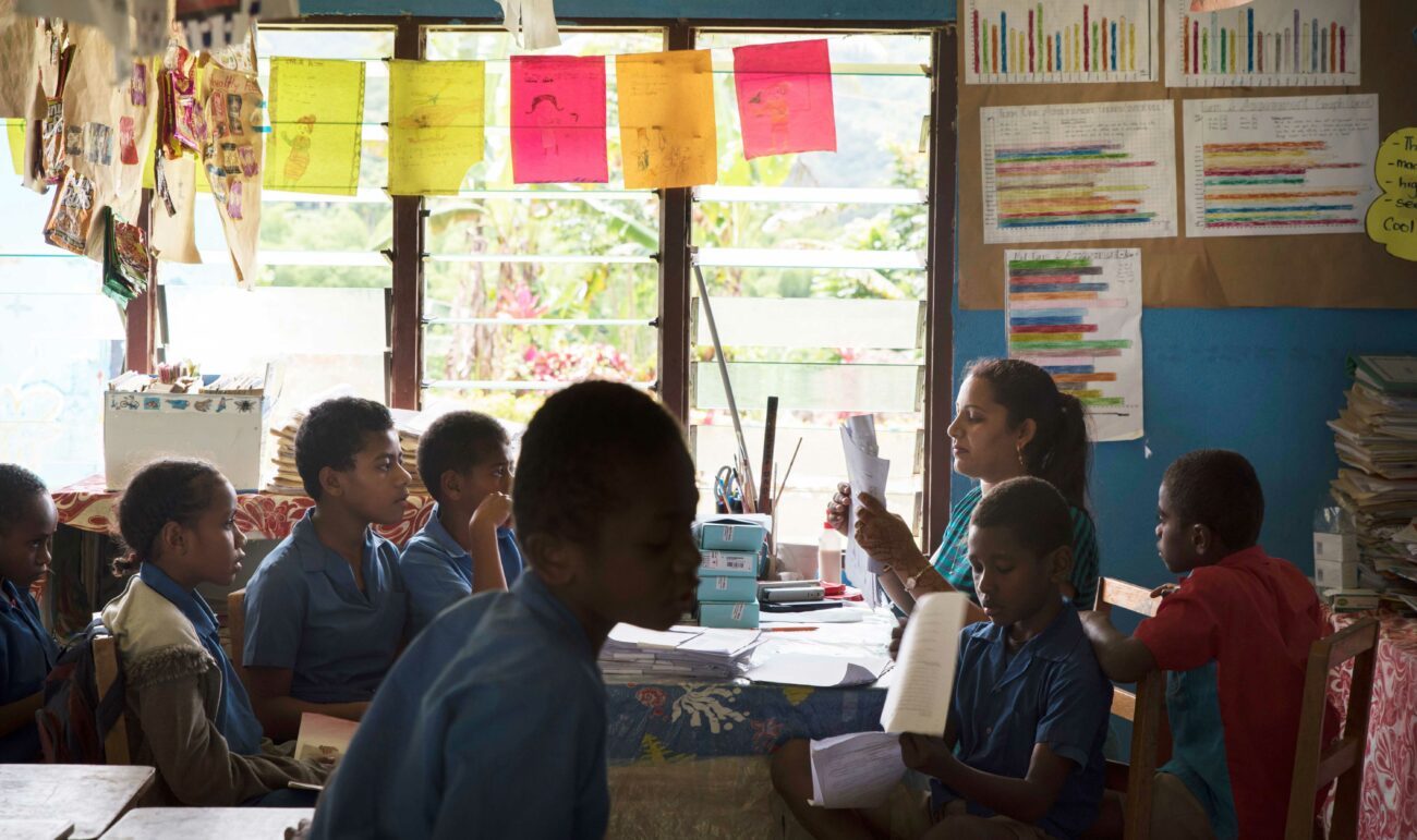 A class of students and their teacher prepare for a lesson with the Beyond the Stars program.