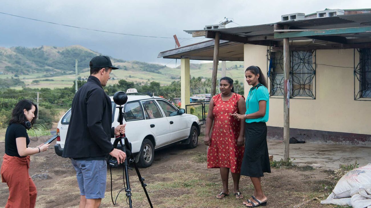 The director of &#039;Our Home, Our People&#039; virtual reality film sets up a 360 shot in Rakraki, Fiji.