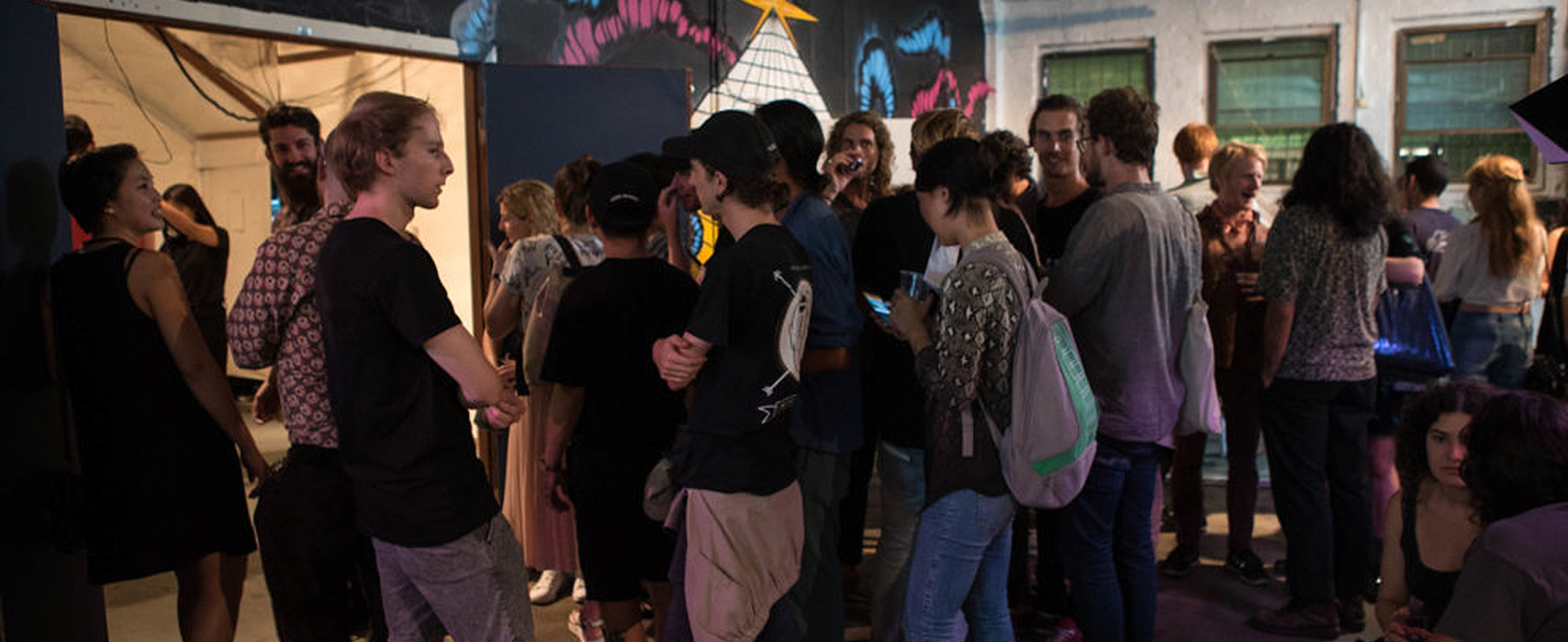 People waiting to enter an experience at Fables.