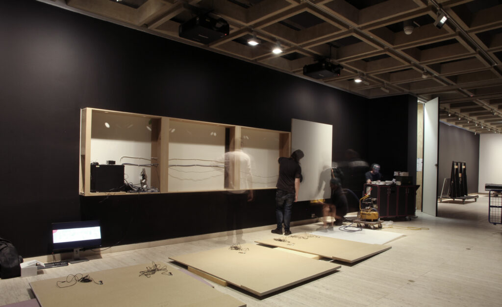 Time lapse photo of constructing the interactive touch wall for the Japan Supernatural exhibition.