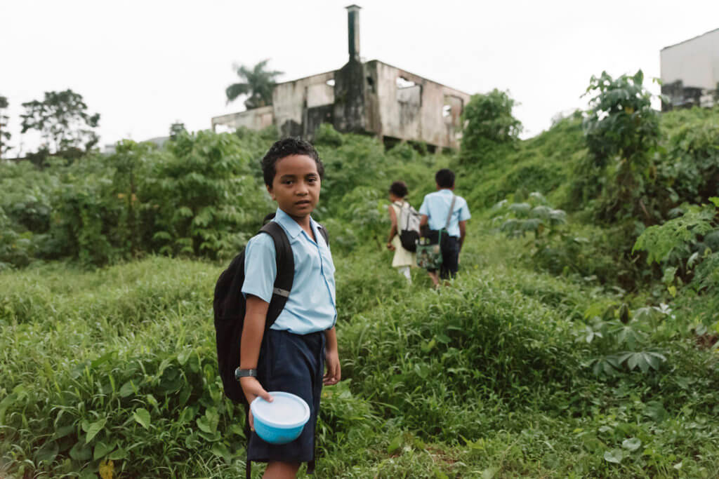 Still image of children from UNICEF TVC Draw the Line.