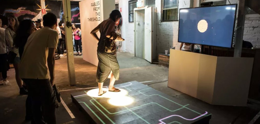 User playing on interactive LED floor.